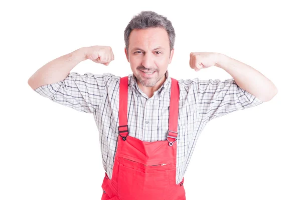 Mechanic, electrician or plumber acting strong and powerful — Stock Photo, Image