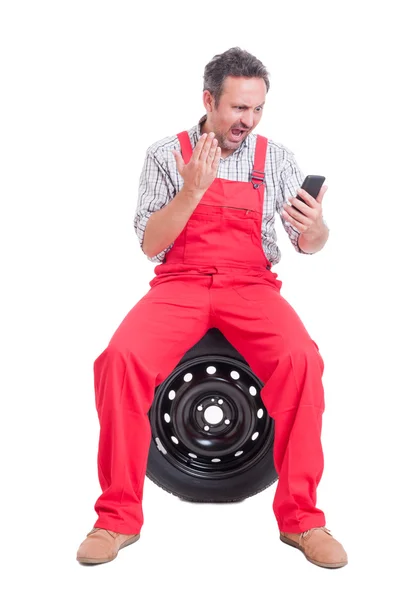 Angry mechanic yelling or shouting on video call — Stock Photo, Image