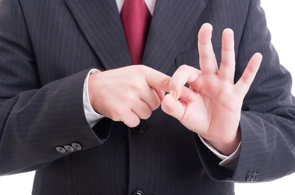 Businessman or accountant making obscene sex connotation gesture — Stock Photo, Image