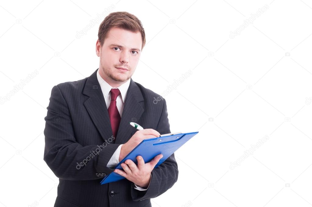 Busy and confident accountant writing on clipboard