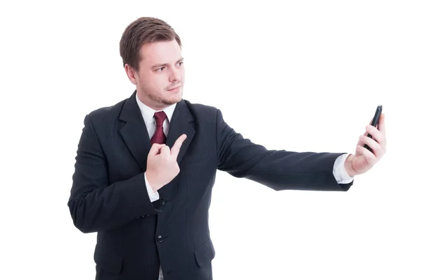 Empresario mostrando el dedo medio en videollamada — Foto de Stock