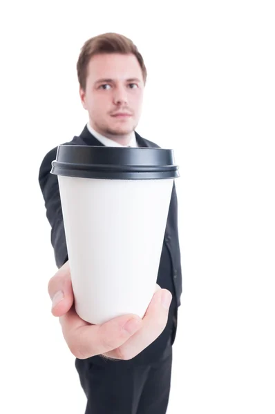 Obchodní muž držící na kávu, jít — Stock fotografie