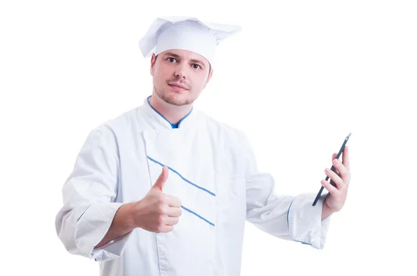 Szef kuchni lub gotować trzymając tabletkę i pokazano jak gest — Zdjęcie stockowe