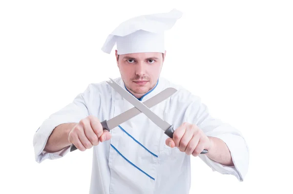 Chef loco o cocinero sosteniendo cuchillos o cuchillas cruzadas —  Fotos de Stock