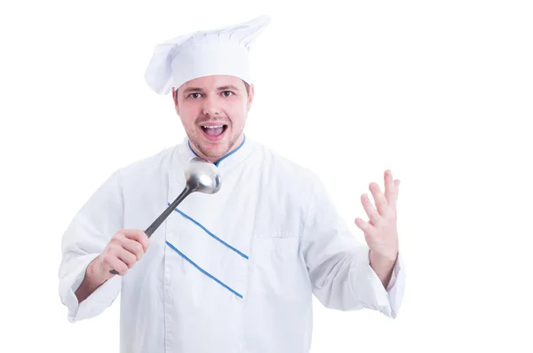 Cook of chef-kok bedrijf pollepel en zang — Stockfoto