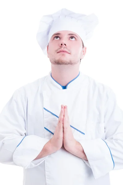 Chef ou cozinheiro orando e olhando para cima — Fotografia de Stock