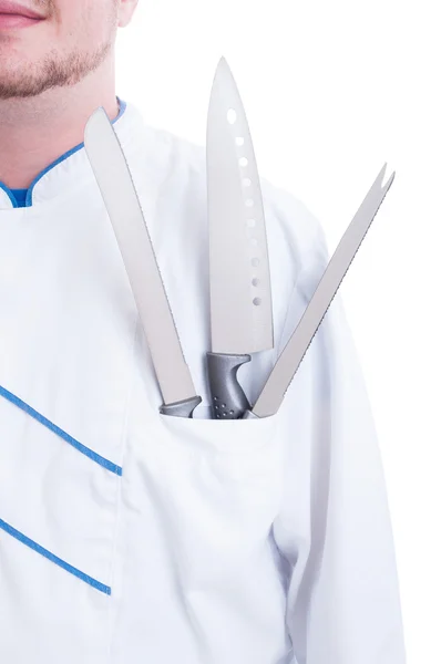 Primer plano con el chef o cocinero uniforme bolsillo en el pecho y cuchillos —  Fotos de Stock