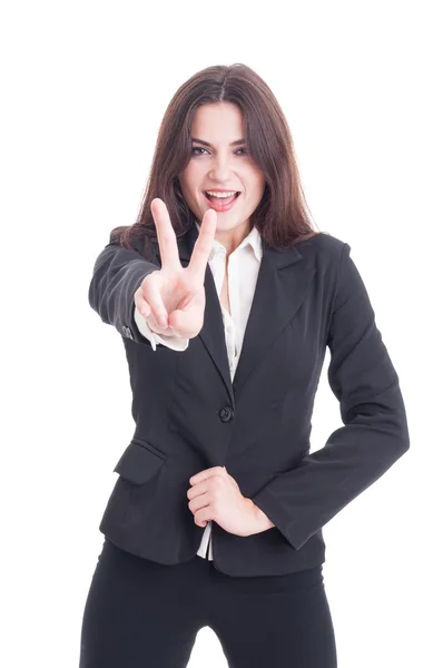 Sonriente mujer de negocios emocionada y entusiasta mostrando paz o —  Fotos de Stock