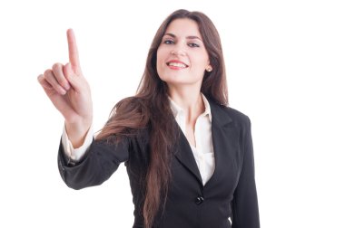 Beautiful business woman touching transparent screen with index