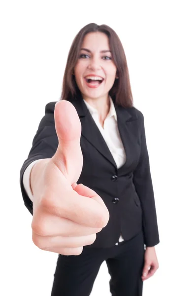 Business woman showing like gesture with selective focus on hand — Stok fotoğraf