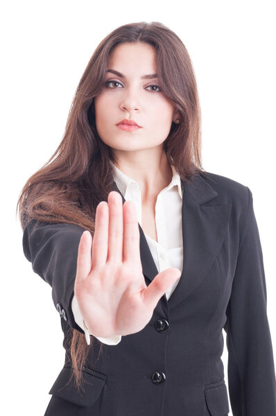 Business woman showing palm as stop, stay, decline or refuse