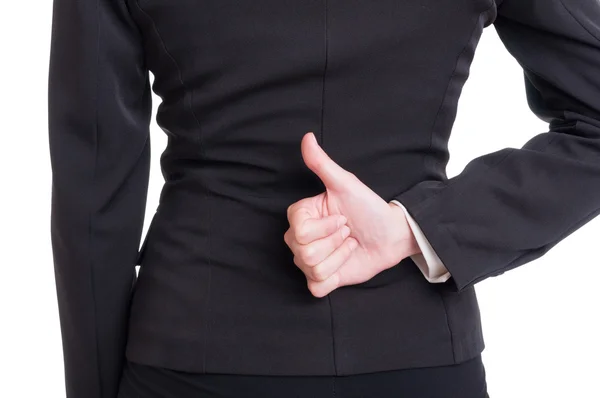 Geschäftsfrau Hand zeigt wie hinter dem Rücken — Stockfoto