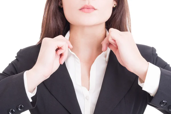 Closeup with young business woman hands adjusting shirt collar — Stock Photo, Image