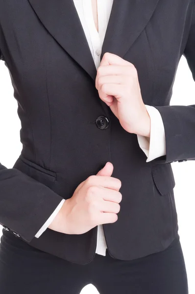 Closeup with business woman hands adjusting suit jacket — Stock Photo, Image