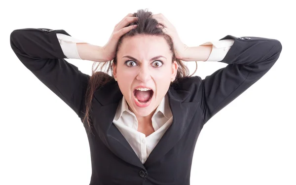 Young business woman acting crazy after stress yelling and shout — Stockfoto
