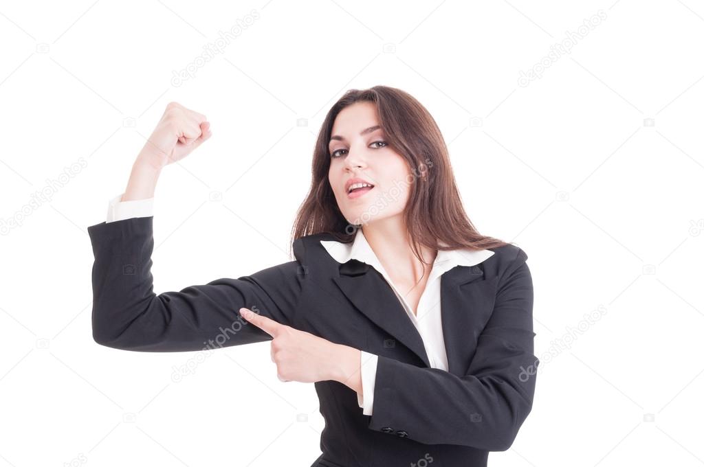 Strong and confident business woman flexing arm and showing powe