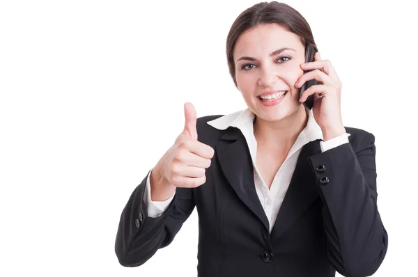 Smiling happy business woman showing like or thumb-up gesture — Stock Photo, Image