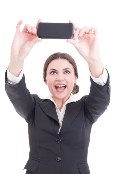 Hermosa joven mujer de negocios tomando una selfie usando un teléfono inteligente —  Fotos de Stock