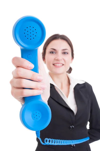 Female contact person showing classic telephone — Stock Photo, Image