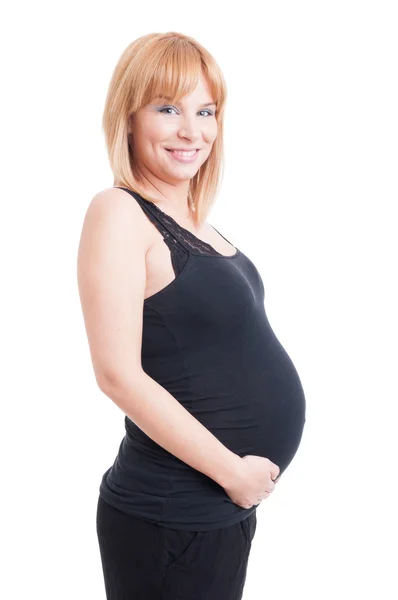 Krásná mladá žena těhotná, usmíval se šťastný izolovaných na bílém b — Stock fotografie