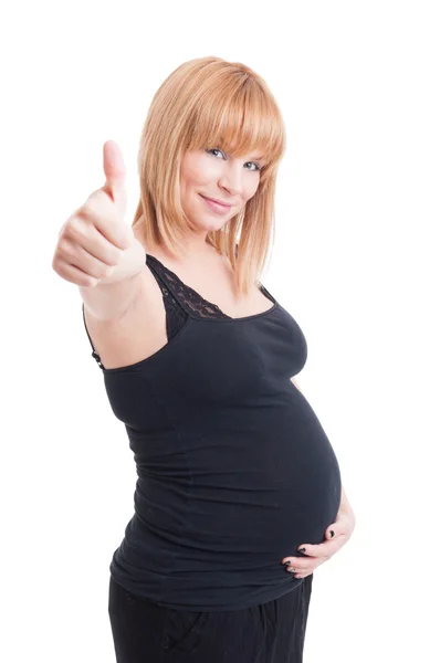 Νεαρή έγκυο δείχνει ομοειδών ή αντίχειρας-επάνω χειρονομία — Φωτογραφία Αρχείου