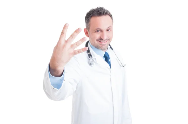 Medic eller läkare visar nummer fyra eller fjärde — Stockfoto