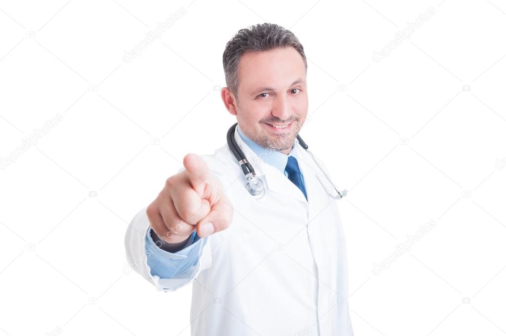 Handsome young doctor pointing finger at the camera or you