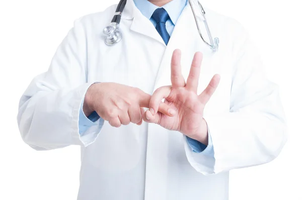 Anonymous proctologyst or gynecologist doctor making finger to h — Stock Photo, Image