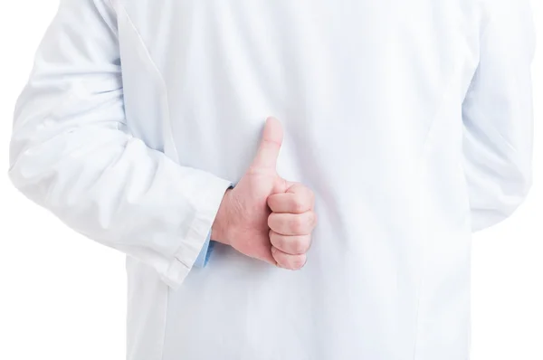 Medic or doctor showing like gesture behind back — Stock Photo, Image