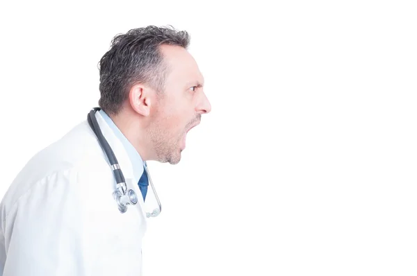 Side view of angry medic or doctor yelling and shouting — Stock fotografie