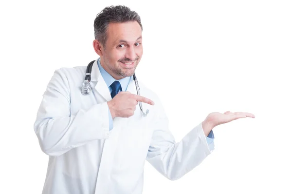 Doctor or medic presenting blank copy space hold on palm — Stock Photo, Image
