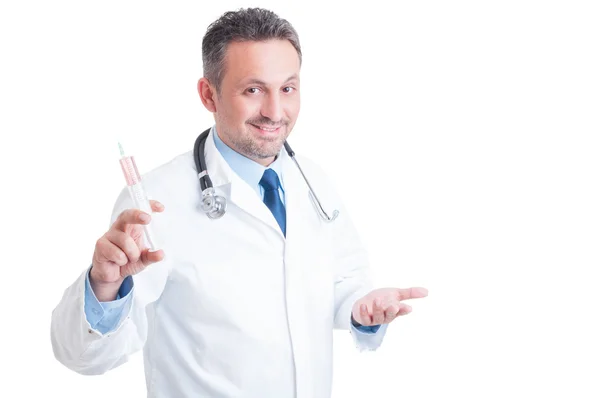 Encouraging doctor or medic holding syringe and inviting to vacc — Stock Photo, Image