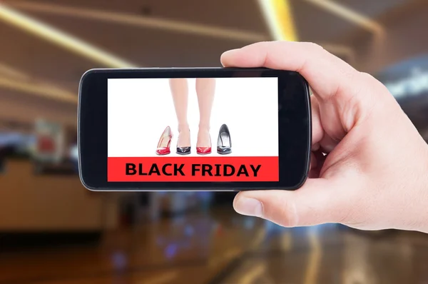 Black Friday para sapatos de mulher em conceptq smartphone — Fotografia de Stock