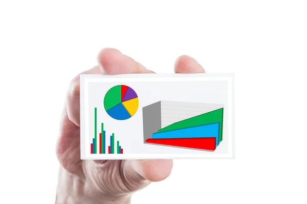 Hand holding paper card with financial charts and graphs — Stock Photo, Image