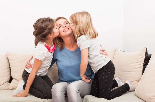 Happy mother with young daughters — Stock Photo, Image