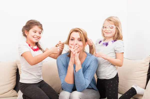 Mother and young daughters having fun at home — Stock Photo, Image