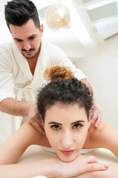 Close-up of young couple in spa and wellness salon — Stock Photo, Image