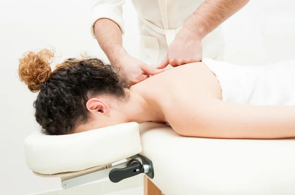 Attractive female getting body or back spa treatment — Stock Photo, Image