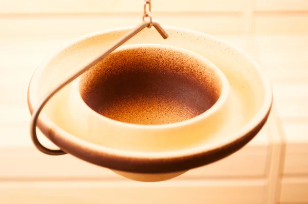 Close-up of ceramics bowl hanging in sauna — Stock Photo, Image