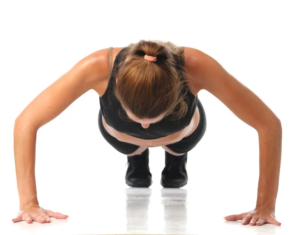 Happy young woman holding doing exercise and stretching — Stock Photo, Image