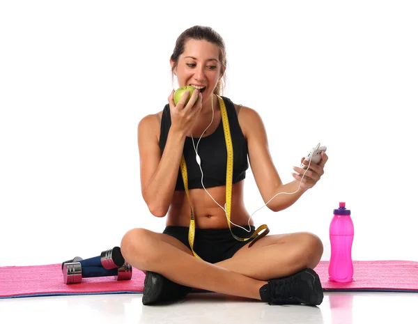 Happy young woman with her fitness equipment — Stock Photo, Image