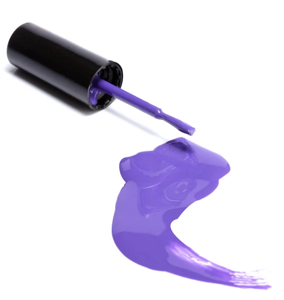 Violet nail polish spilled on white background — Stock Photo, Image