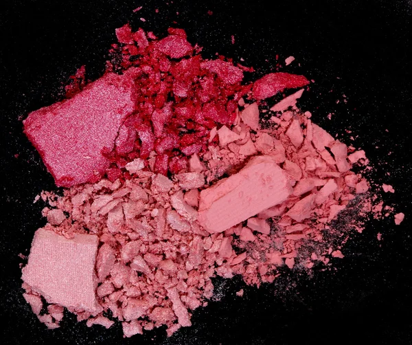 Närbild på en make up pulver på svart bakgrund — Stockfoto
