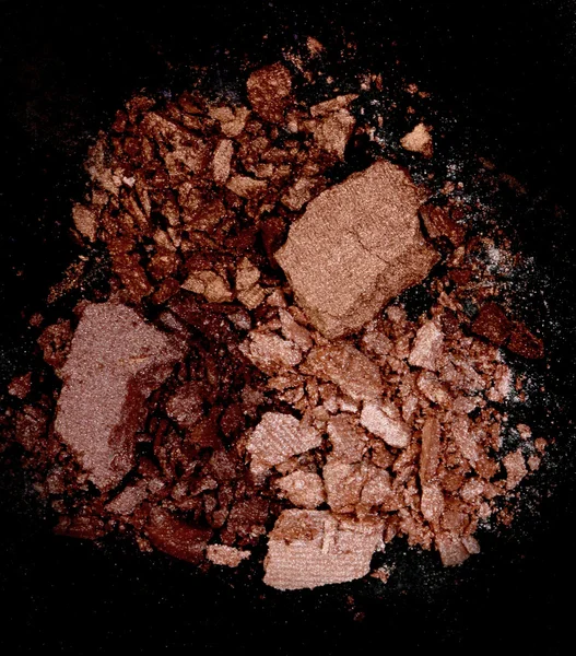 Close up of a make up powder on black background — Stock Photo, Image