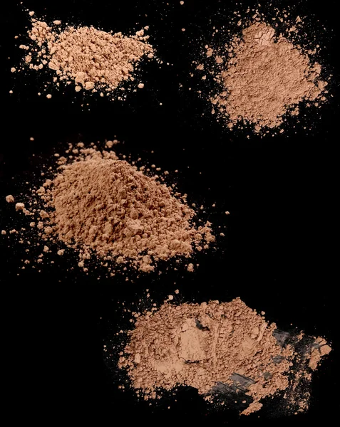 Close up of a make up powder on black background — Stock Photo, Image