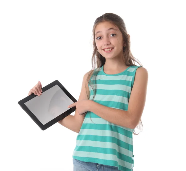 Beautiful pre-teen girl with a tablet computer. — Stock Photo, Image