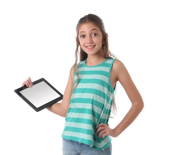 Beautiful pre-teen girl with a tablet computer. Isolated. — Stock Photo, Image