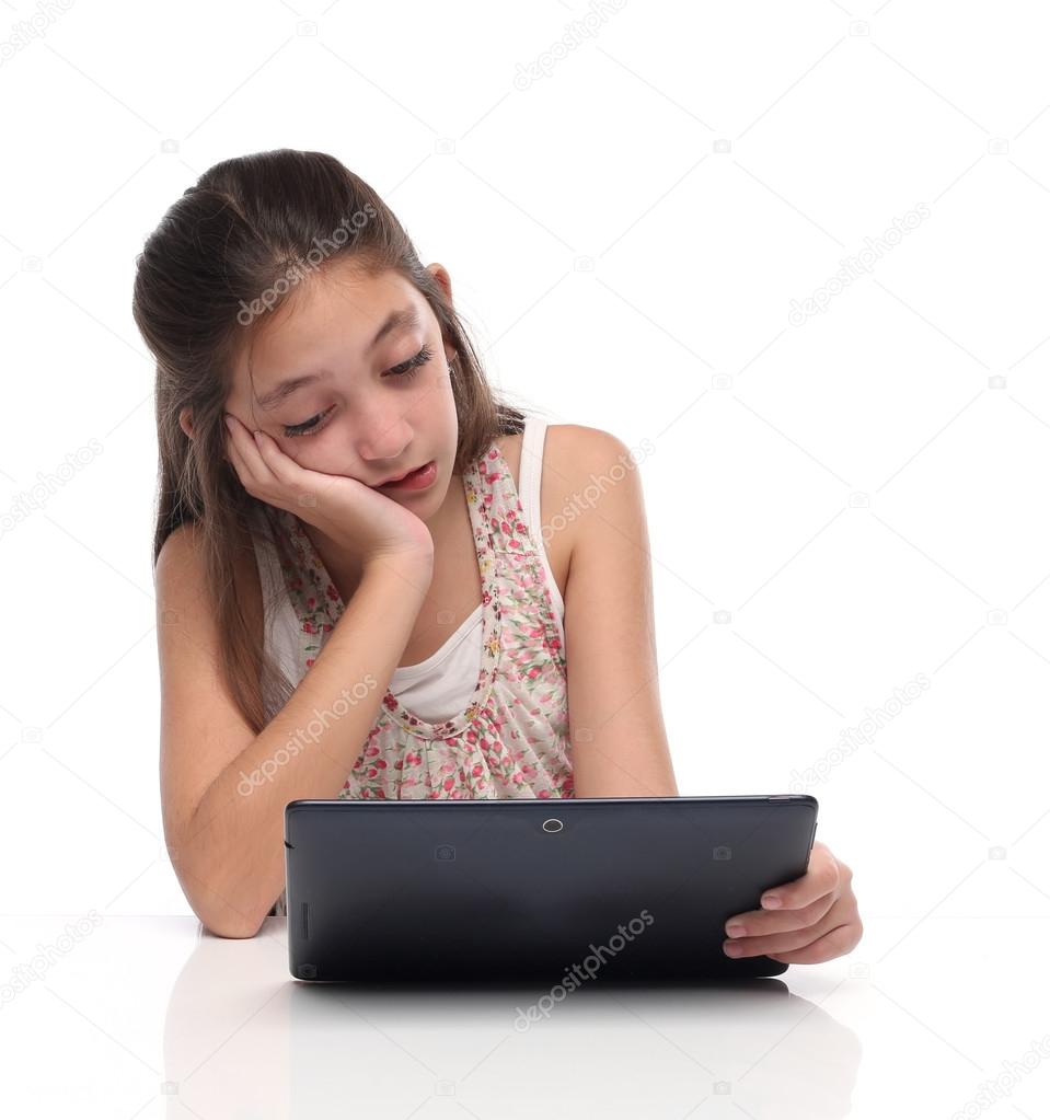 Boring. Pre-teen girl with a tablet computer.