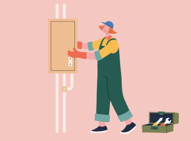 Kadın elektrikçi sigorta kutusunu tamir ediyor. Pembe arka planda sigorta kutusuyla elektrik sorununu tamir eden bir kadın tasviri. İş yerinde kadın kavramı