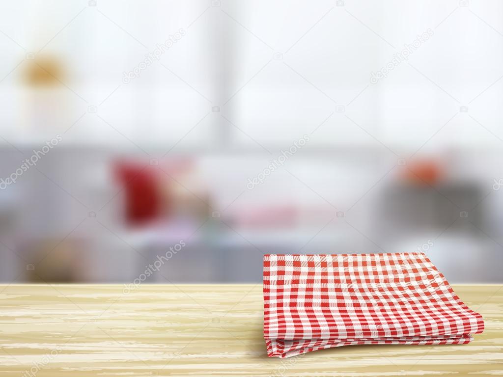 closeup of wooden desk and tablecloth in room